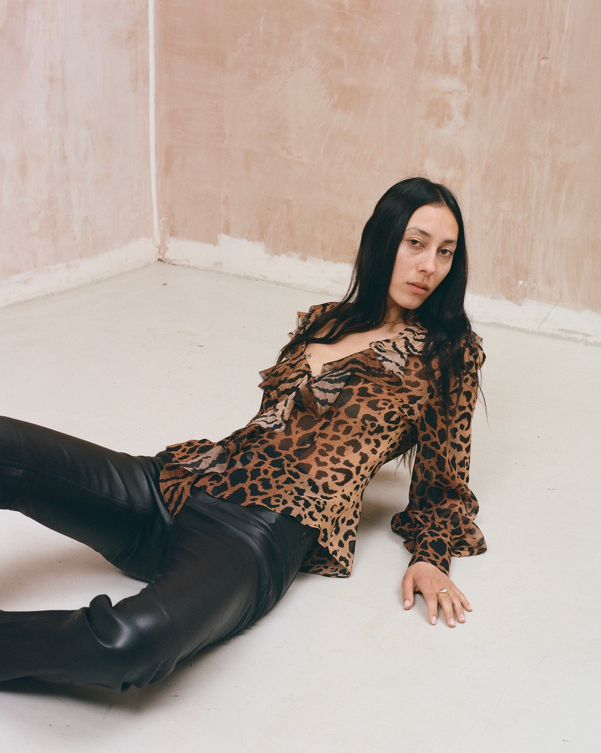 Leopard print silk blouse with ruffle front and button through opening