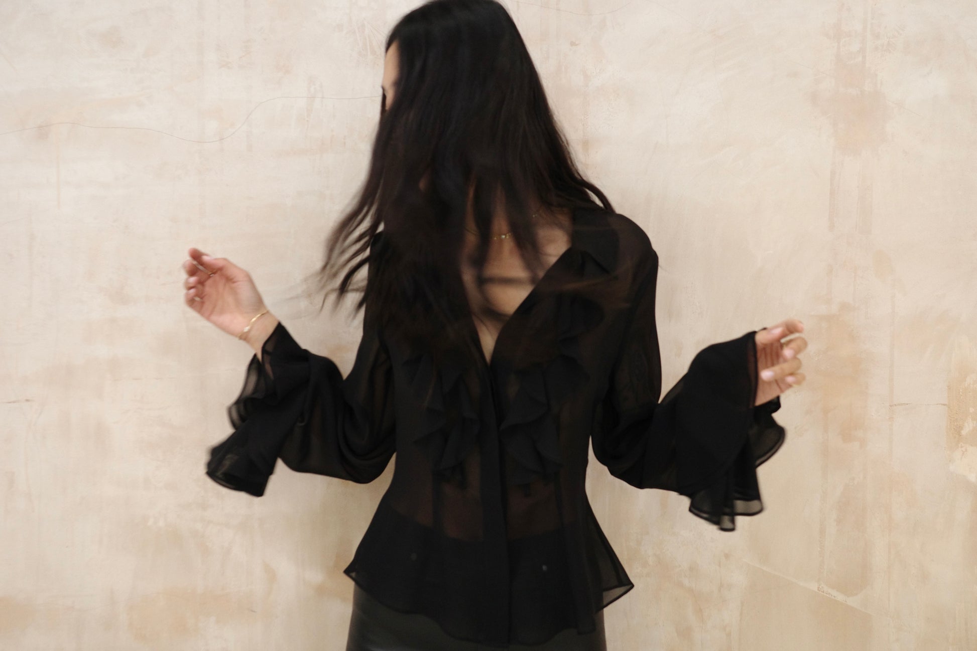 Black silk ruffle blouse with frill cuff